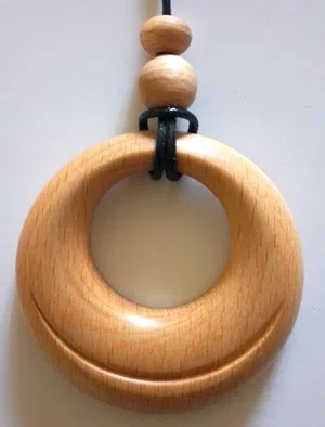 Handcrafted Wooden Pendants – Asymmetry in a Circle