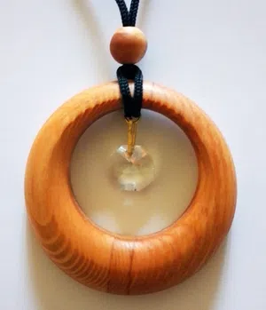 Handcrafted Wooden Pendants – Asymmetry in a Circle