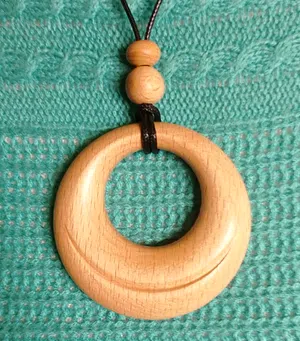 Handcrafted Wooden Pendants – Asymmetry in a Circle